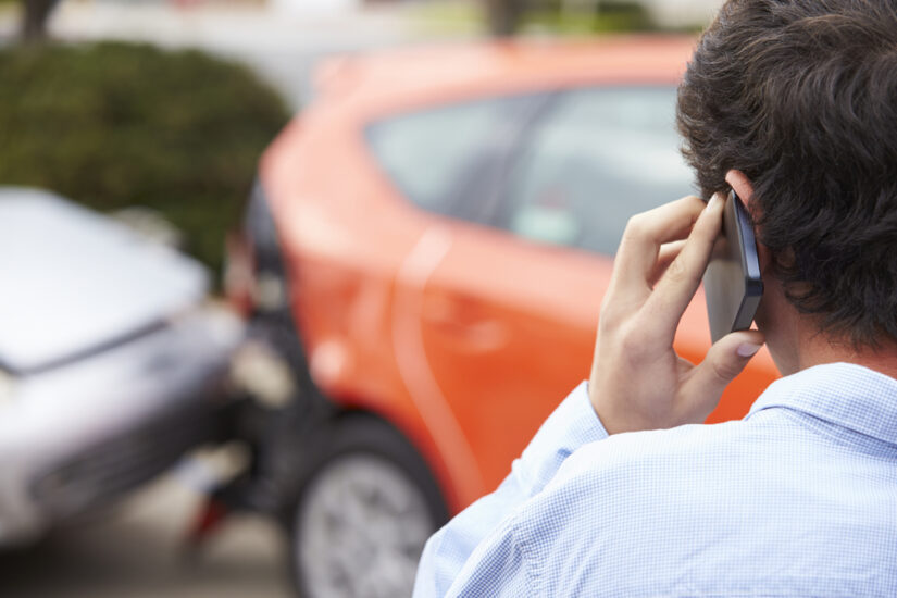 Photo of a Driver Calling after Car Accident